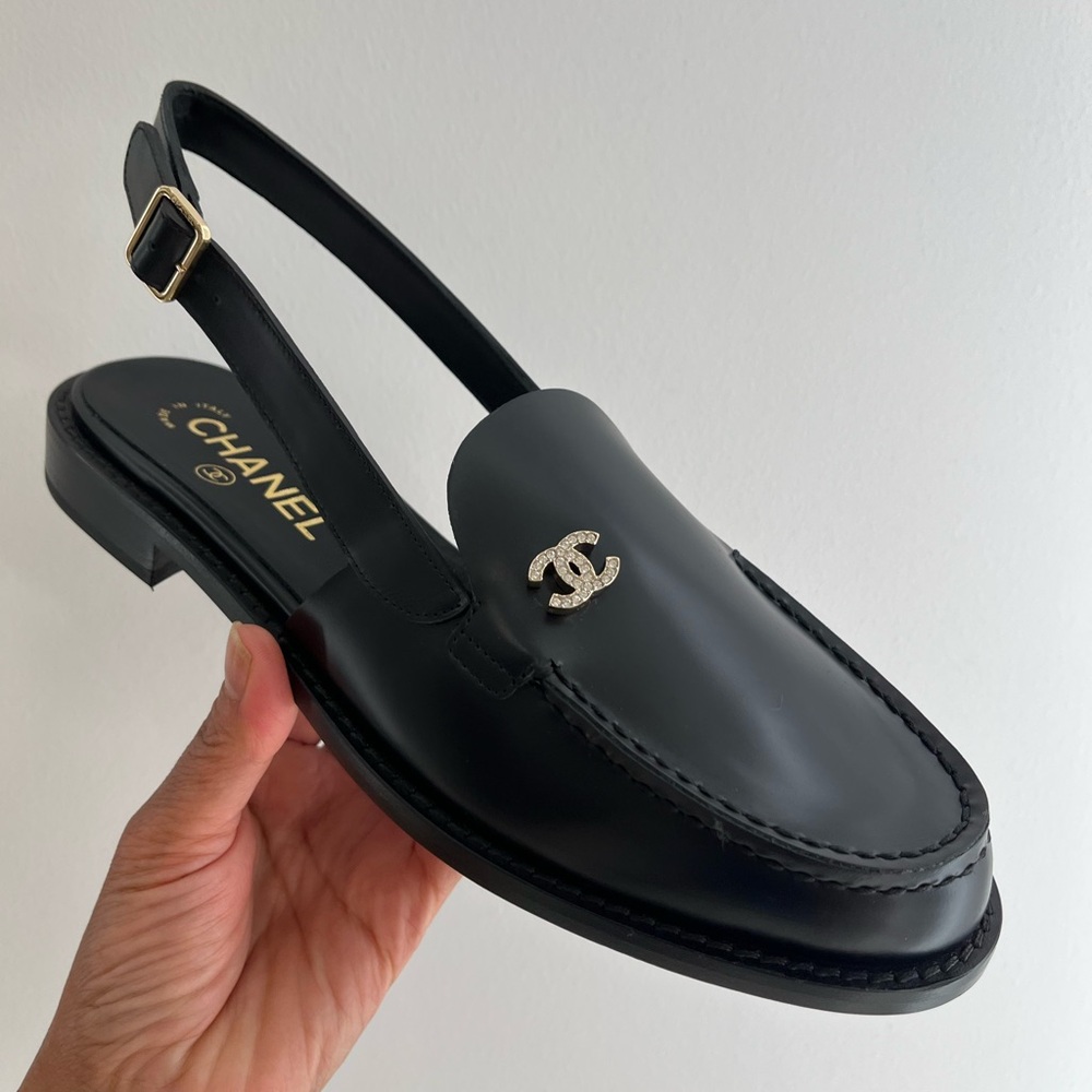 CHANEL Black Slingback Loafers with Silver Logo